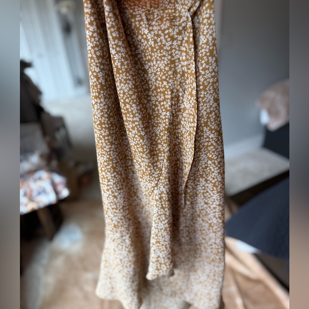 Very pretty faux wrap style skirt.